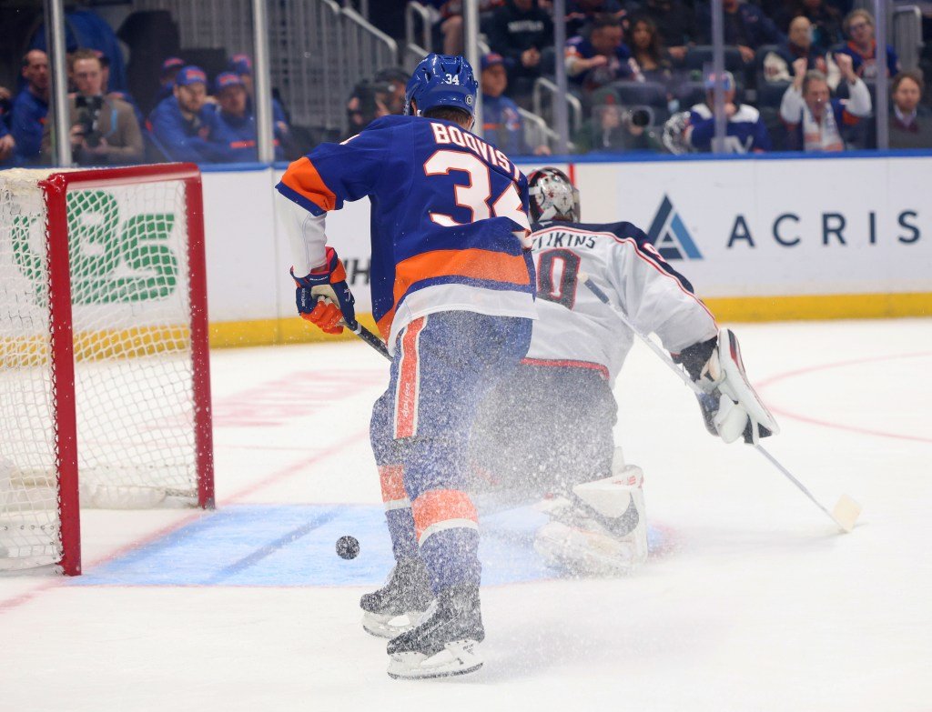 Adam Boqvist attempts a shot during the Islanders' shootout loss to the Blue Jackets on March 24.